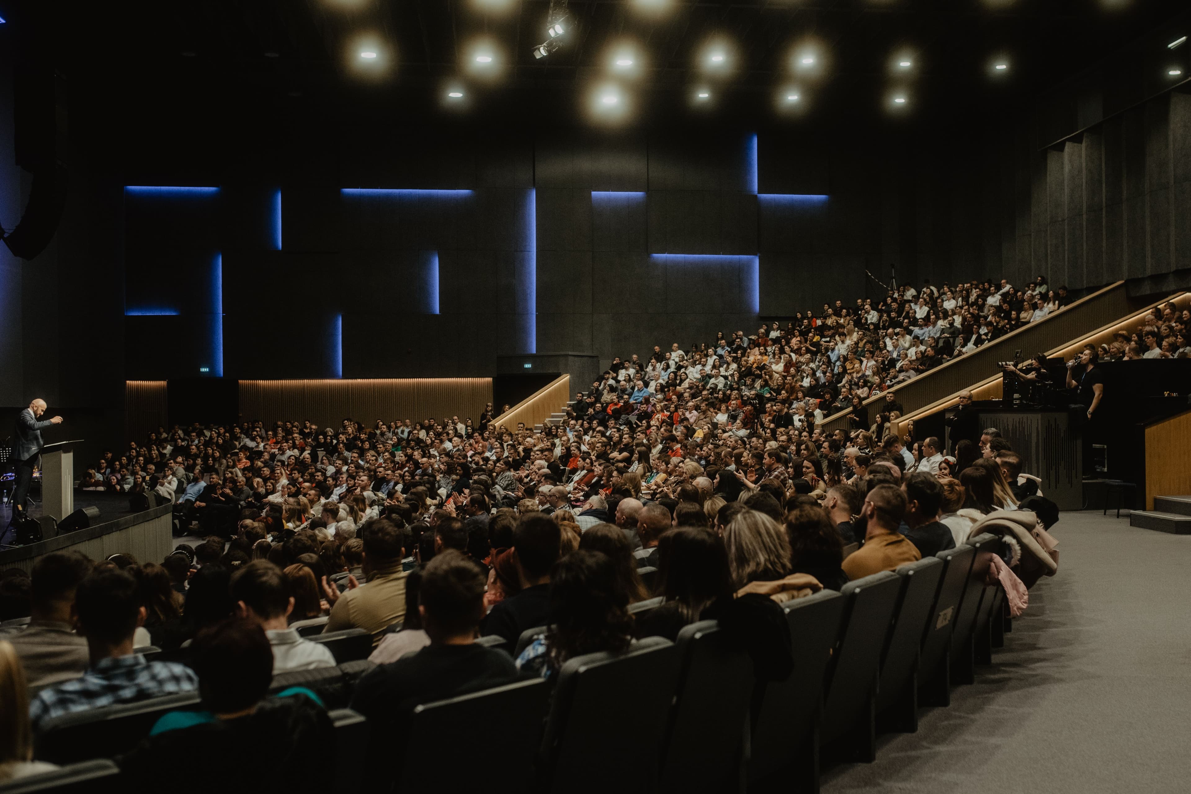 Peoples Gathering in a Hall